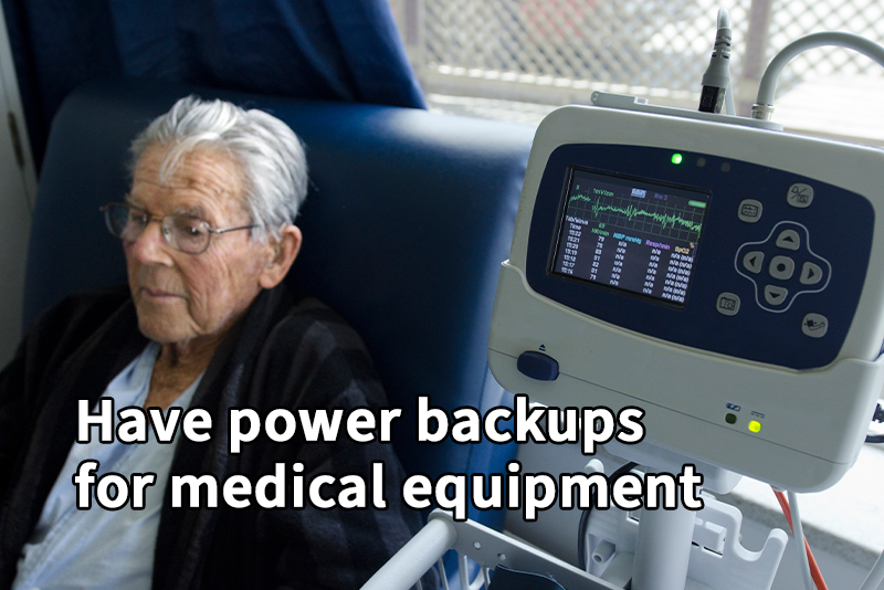 An elderly man in a bathrobe sits next to a machine displaying medical information. Text reads, "Have power backups for medical equipment."