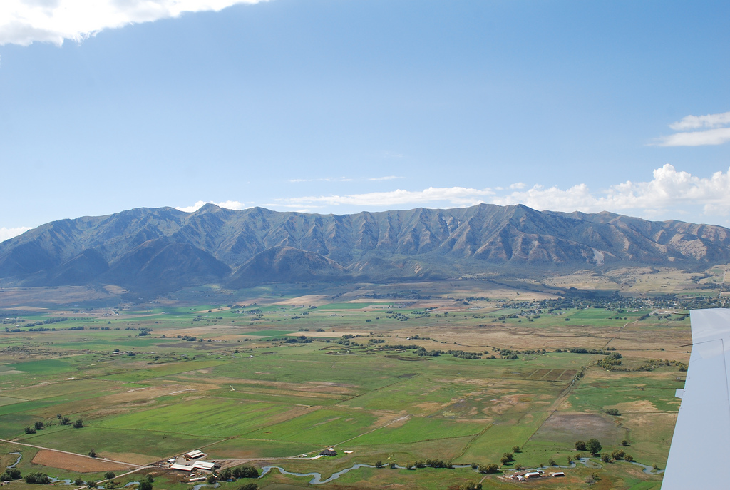 Valley landscape bordered by mountains in the summer
