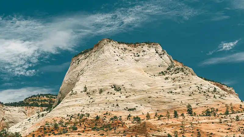 Desert sandstone mountain with a blue sky